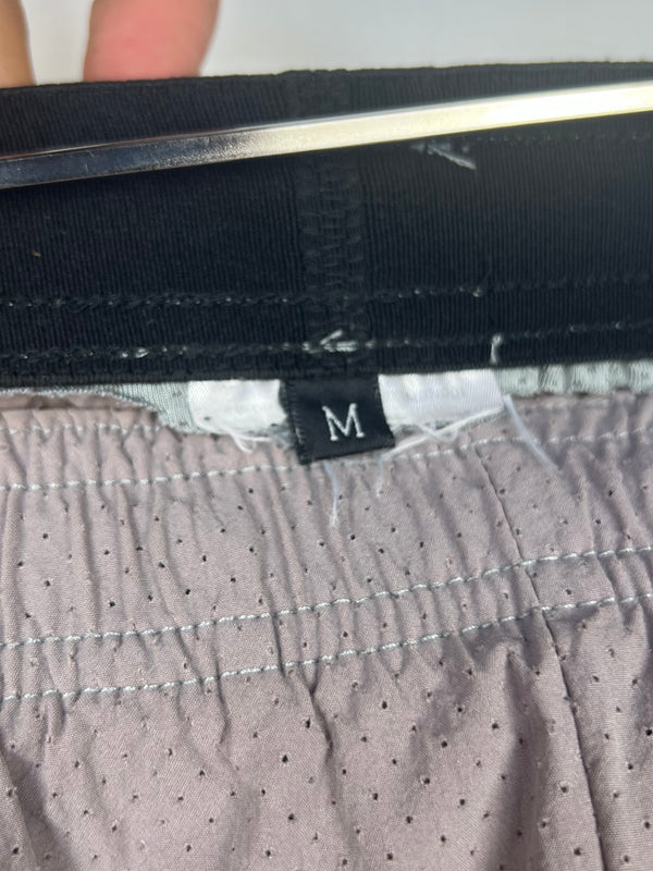 Running short , size M