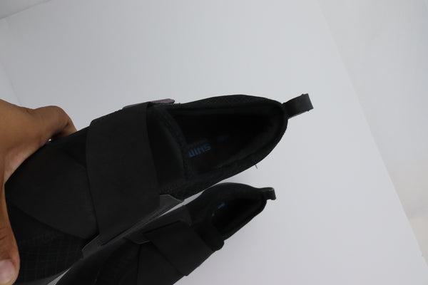 black Shimano SH-IC100 indoor cycling shoes.