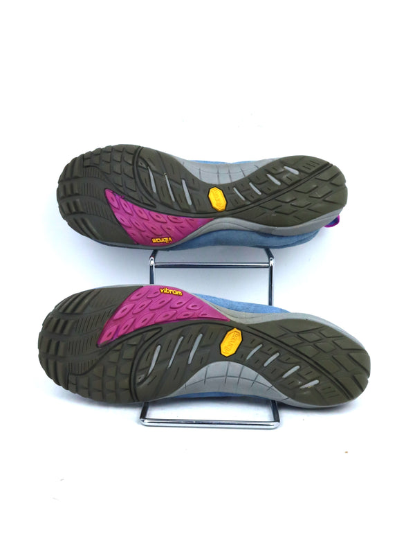 Merrell Jungle Moc slip-on shoes with a blue suede upper and a grey sole.