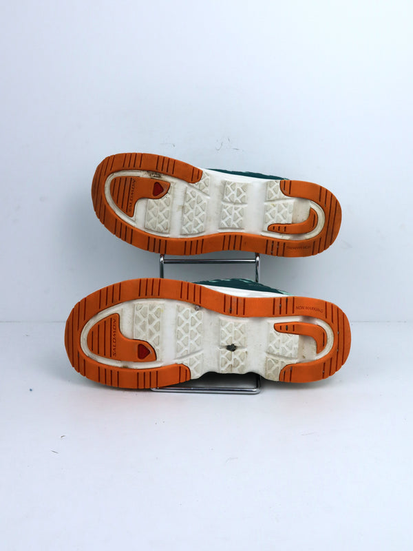 Salomon Crossamphibian Swift water shoes in a teal stretch mesh material.