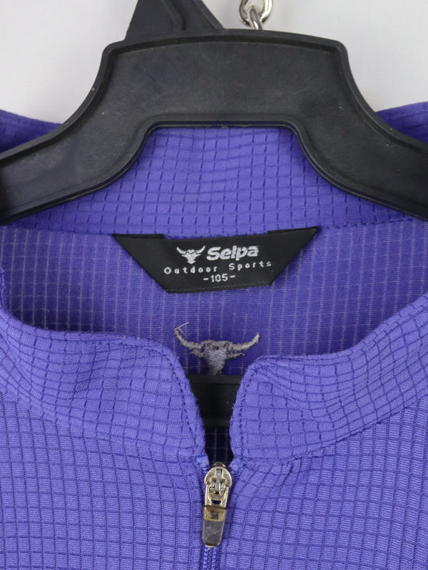 Selpa cycling jersey in purple with a quarter-zip neck and gray side panels.
