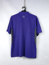 Selpa cycling jersey in purple with a quarter-zip neck and gray side panels.