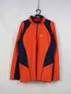 Millet Morpho Zip long-sleeved hiking tee-shirt in orange and blue made with Polartec Power Dry fabric.