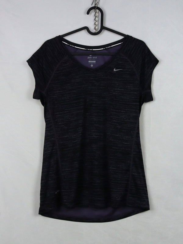 Nike Dri-FIT running top made of a polyester microfiber blend designed to wick away sweat