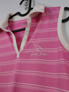 Under Armour women's pink sleeveless golf polo shirt.