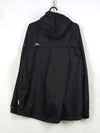 Trespass Unisex Qikpac waterproof packaway jacket with a lime green zipper.