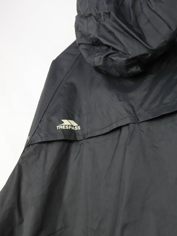 Trespass Unisex Qikpac waterproof packaway jacket with a lime green zipper.