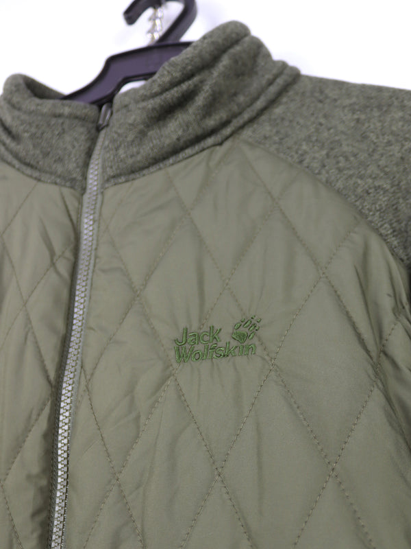 Jack Wolfskin hybrid jacket in green with quilted and fleece sections.