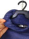 The North Face navy blue fleece pullover.