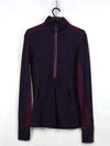 Lululemon Star Runner 1/2 Zip Pullover in a deep purple colorway, likely featuring mesh detailing on the back and sleeves.