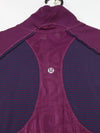 Lululemon Star Runner 1/2 Zip Pullover in a deep purple colorway, likely featuring mesh detailing on the back and sleeves.