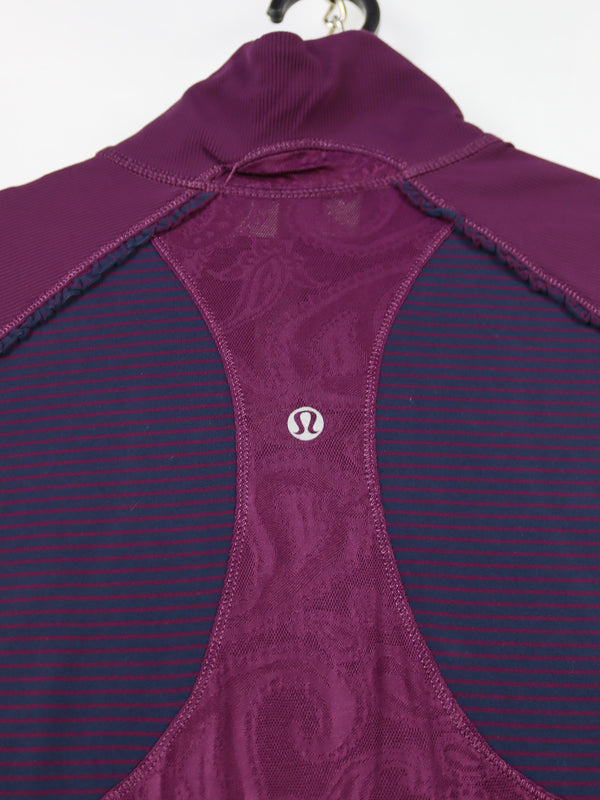Lululemon Star Runner 1/2 Zip Pullover in a deep purple colorway, likely featuring mesh detailing on the back and sleeves.