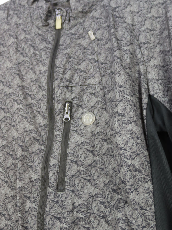 Crane women's cycling lightweight packable full-zip windbreaker jacket.