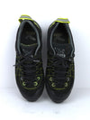 Salewa Mountain Trainer 2 GTX low-cut hiking shoe in a black and yellow color scheme.