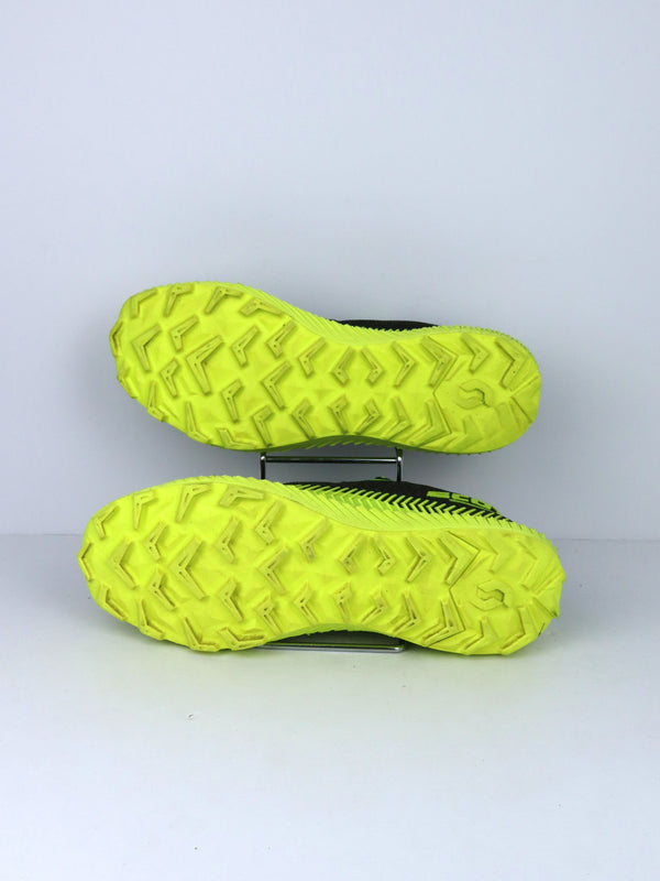 Scott Supertrac Ultra RC trail running shoes in a black and yellow colorway.