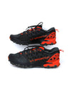 La Sportiva Bushido II trail running shoes in a black and red colorway.