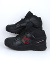 Five Ten Impact High mountain bike shoes in black with red branding.