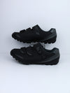 Shimano SH-ME3 (or SH-ME301) mountain bike shoes with a rubber outsole and two hook-and-loop straps.