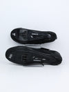 black Shimano SH-IC100 indoor cycling shoes.
