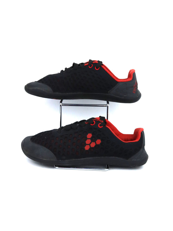 Vivobarefoot Stealth II running shoes in a black and red colorway.