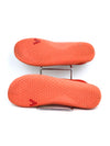 Vivobarefoot Primus Lite women's barefoot exercise shoes in an orange and lime green colorway with a hexagonal pattern.