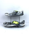 Vivobarefoot Ultra Bloom kids' junior footwear in a black, white, and aqua color.