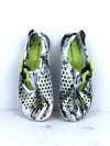 Vivobarefoot Ultra Bloom kids' junior footwear in a black, white, and aqua color.