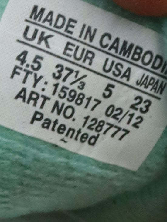 Salomon Crossamphibian Swift water shoes in a teal stretch mesh material.