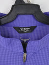 Selpa cycling jersey in purple with a quarter-zip neck and gray side panels.