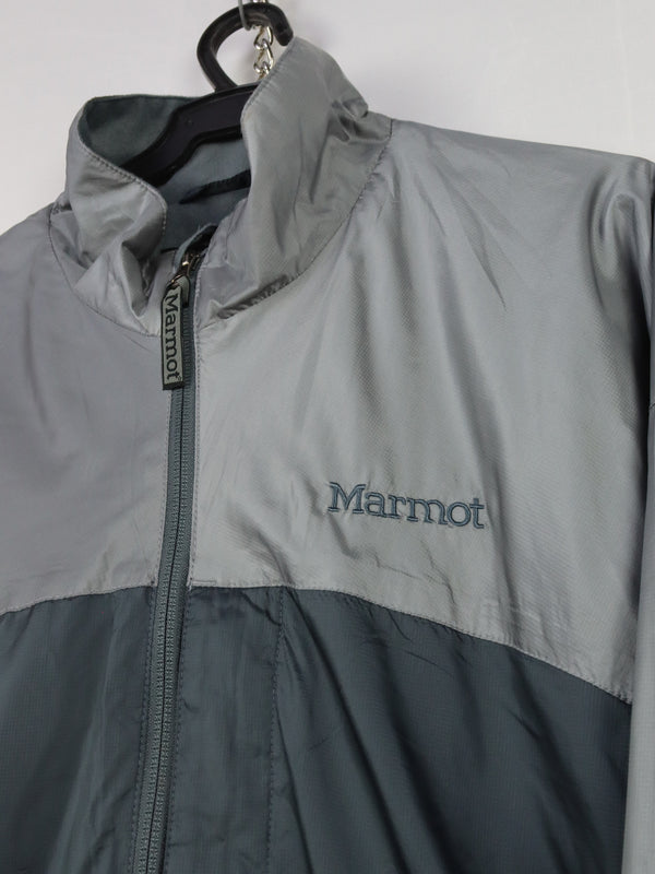 Marmot men's two-toned gray and black lightweight full-zip windbreaker jacket.