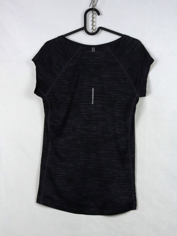 Nike Dri-FIT running top made of a polyester microfiber blend designed to wick away sweat