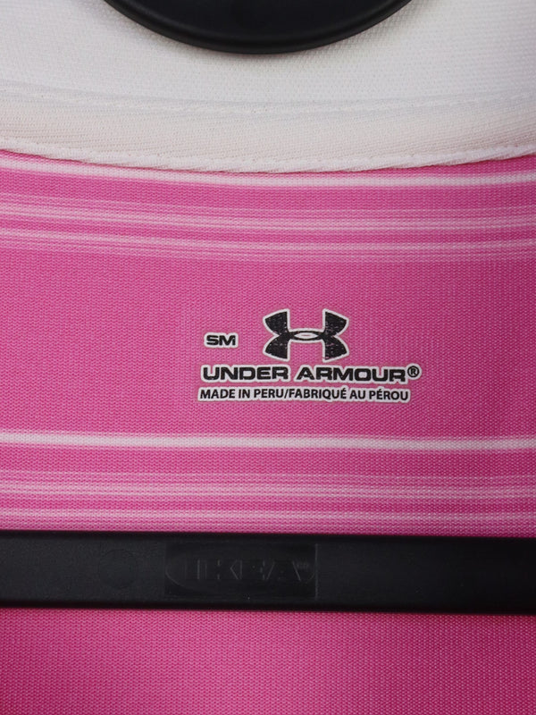 Under Armour women's pink sleeveless golf polo shirt.