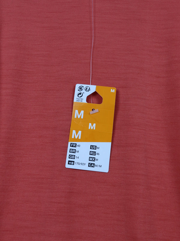This is a Women's Forclaz Trek 500 coral merino wool mountain trekking t-shirt.