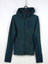 REI running jacket in teal or dark green