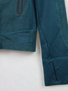 REI running jacket in teal or dark green