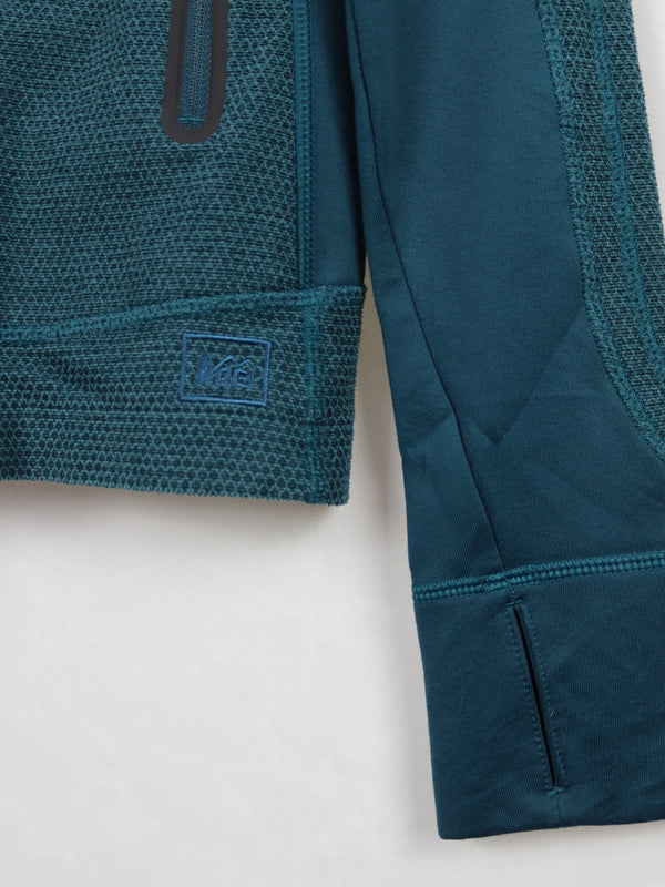 REI running jacket in teal or dark green