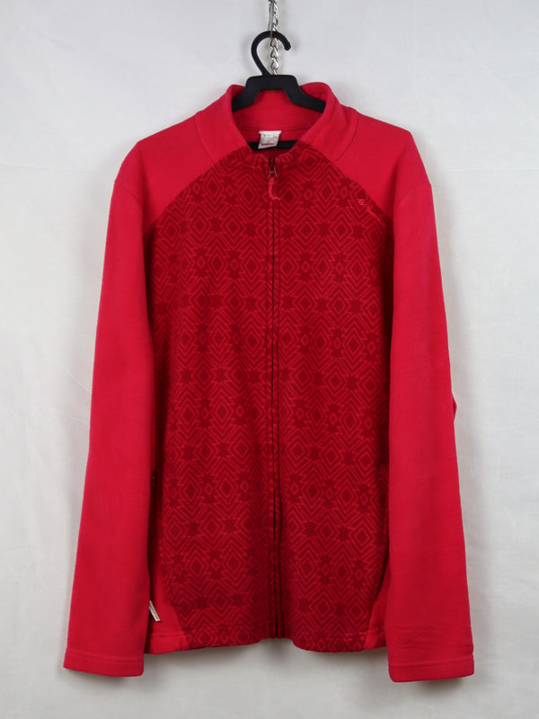 QUECHUA full-zip fleece jacket with a patterned print.