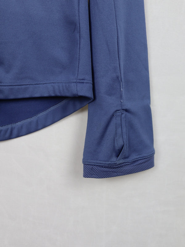Kalenji by Decathlon athletic running jacket in blue with a printed vest overlay.