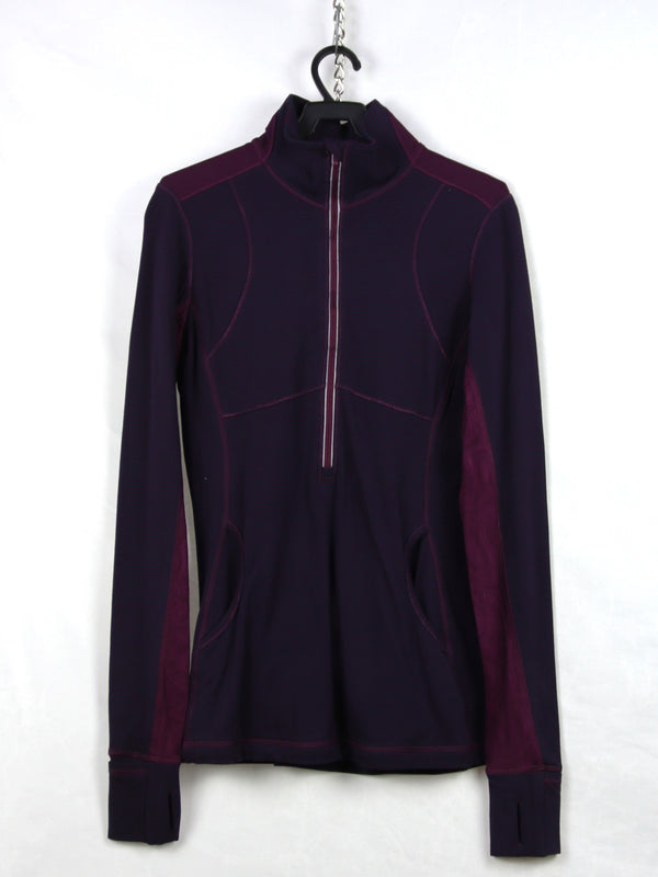 Lululemon Star Runner 1/2 Zip Pullover in a deep purple colorway, likely featuring mesh detailing on the back and sleeves.