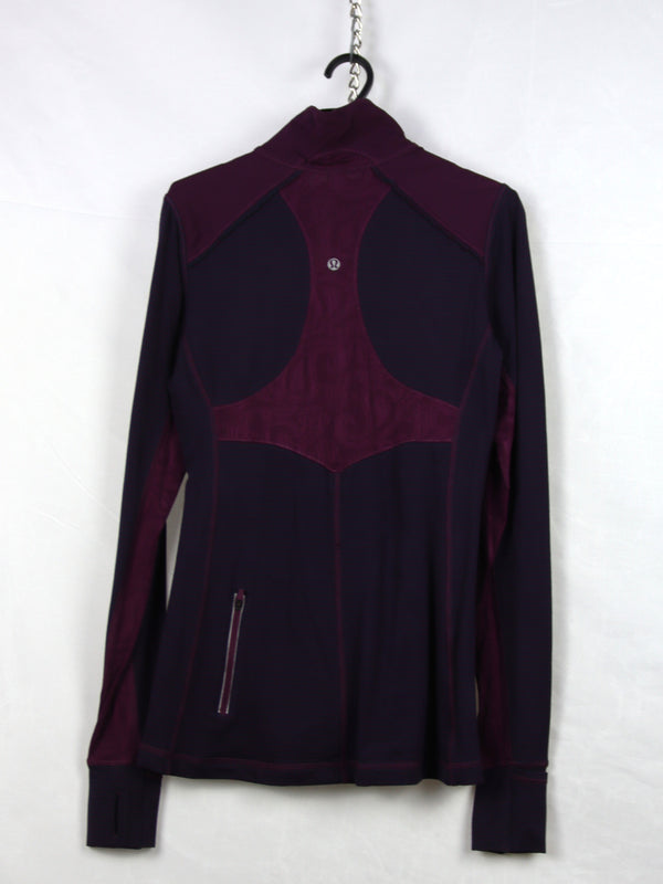 Lululemon Star Runner 1/2 Zip Pullover in a deep purple colorway, likely featuring mesh detailing on the back and sleeves.