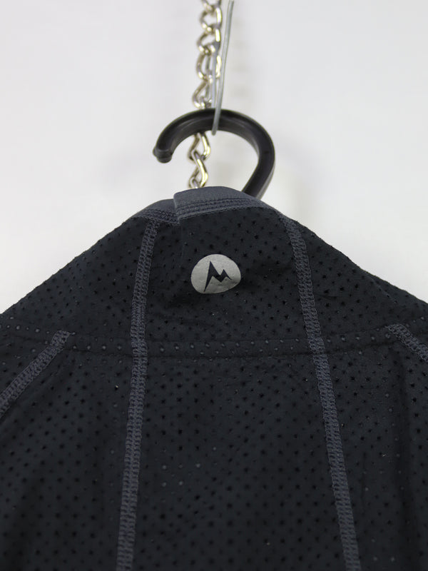 Marmot women's jacket featuring a full-length zipper and zippered pockets.