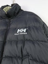 Helly Hansen HH Urban Reversible Puffer Jacket in black, featuring synthetic blowable insulation and ripstop fabric.