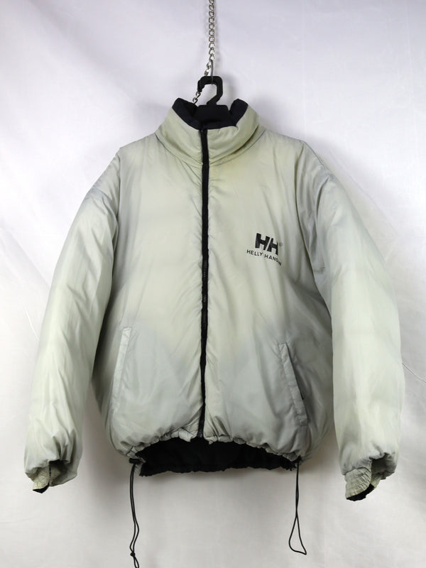 Helly Hansen HH Urban Reversible Puffer Jacket in black, featuring synthetic blowable insulation and ripstop fabric.