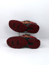 Salomon Wings Flyte 2 GTX trail running shoes in a black and red colorway with yellow detailing.