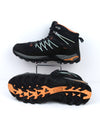 CMP Rigel Mid Waterproof hiking boots in a black, grey, and orange colorway