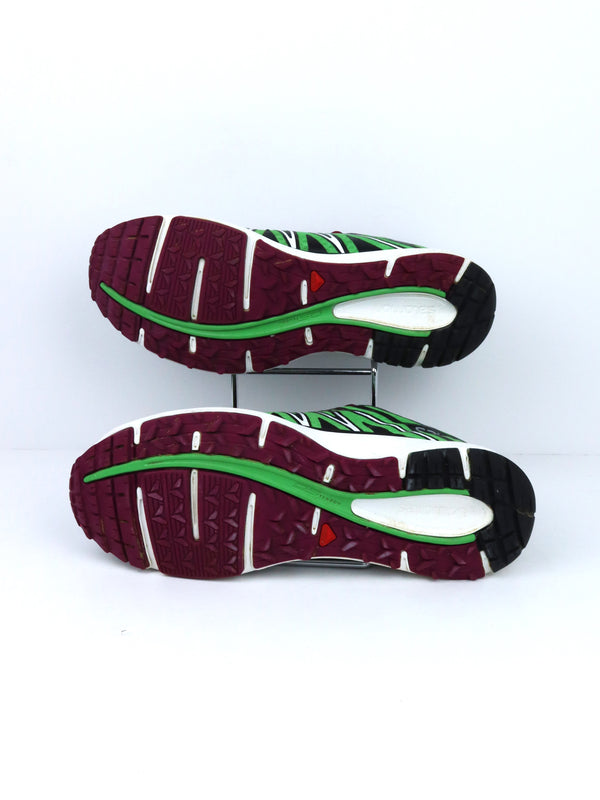 Salomon X Tour City running shoe in green with black and white accents.