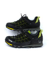 Salewa Mountain Trainer 2 GTX low-cut hiking shoe in a black and yellow color scheme.