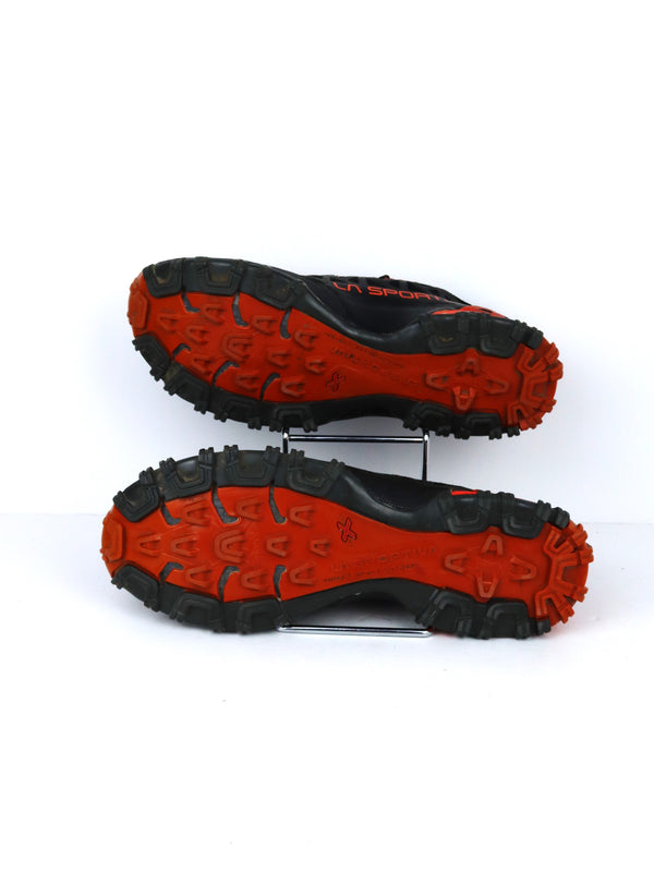La Sportiva Bushido II trail running shoes in a black and red colorway.