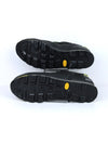 Salewa Mountain Trainer GTX hiking shoes in black with yellow accents, featuring a GORE-TEX lining and a Vibram sole.