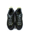 Salewa Mountain Trainer GTX hiking shoes in black with yellow accents, featuring a GORE-TEX lining and a Vibram sole.